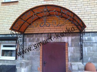 Козырек над входом кованый